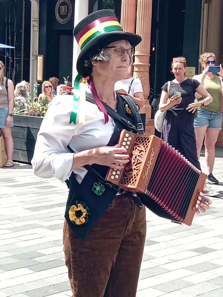 Stephanie plays melodeon for Champs at Brighton